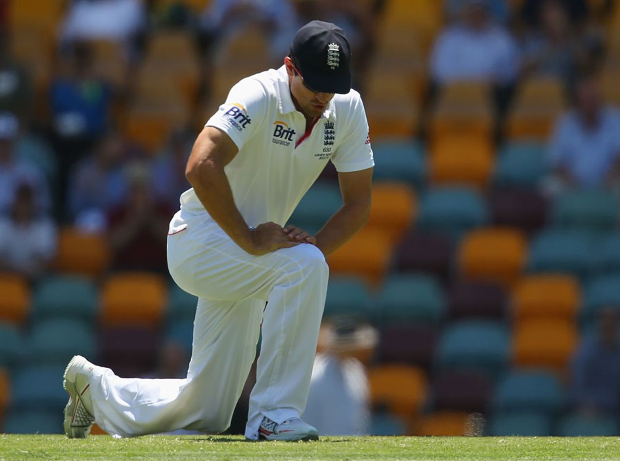 On their knees: Alastair Cook's team were flayed around the Gabba, Australia v England, 1st Test, Brisbane, 3rd day, November 23, 2013