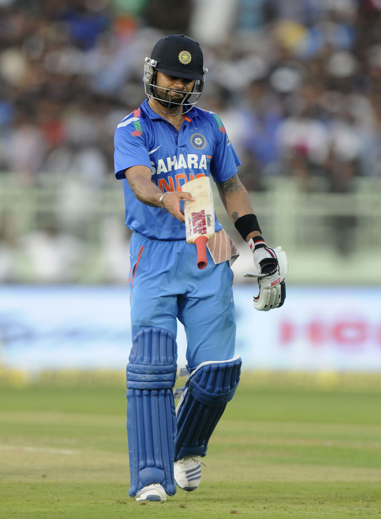 Virat Kohli walks back dejected after falling for 99, India v West Indies, 2nd ODI, Visakhapatnam, November 24, 2013