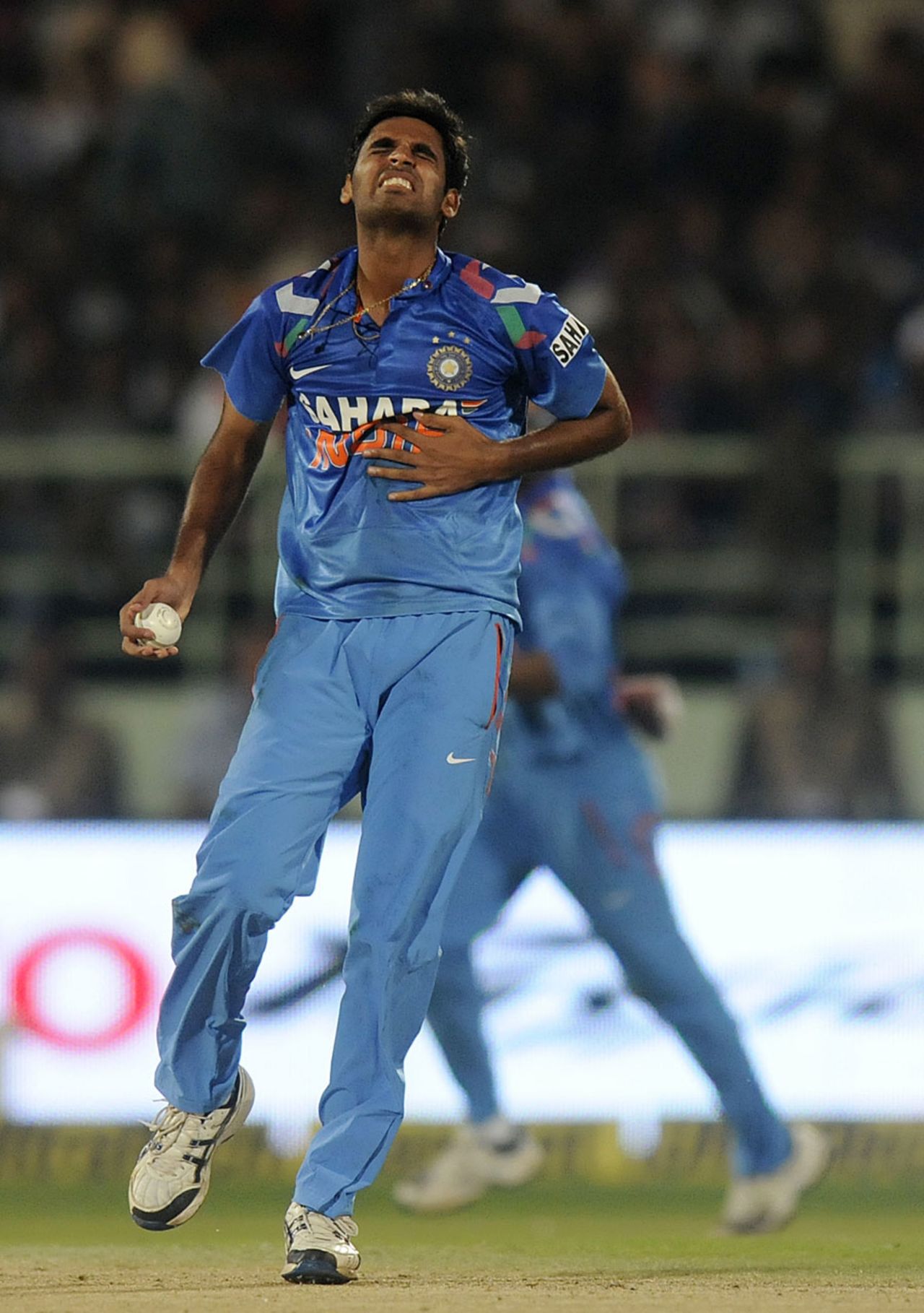 Bhuvneshwar Kumar reacts after being struck in the chest, India v West Indies, 2nd ODI, Visakhapatnam, November 24, 2013