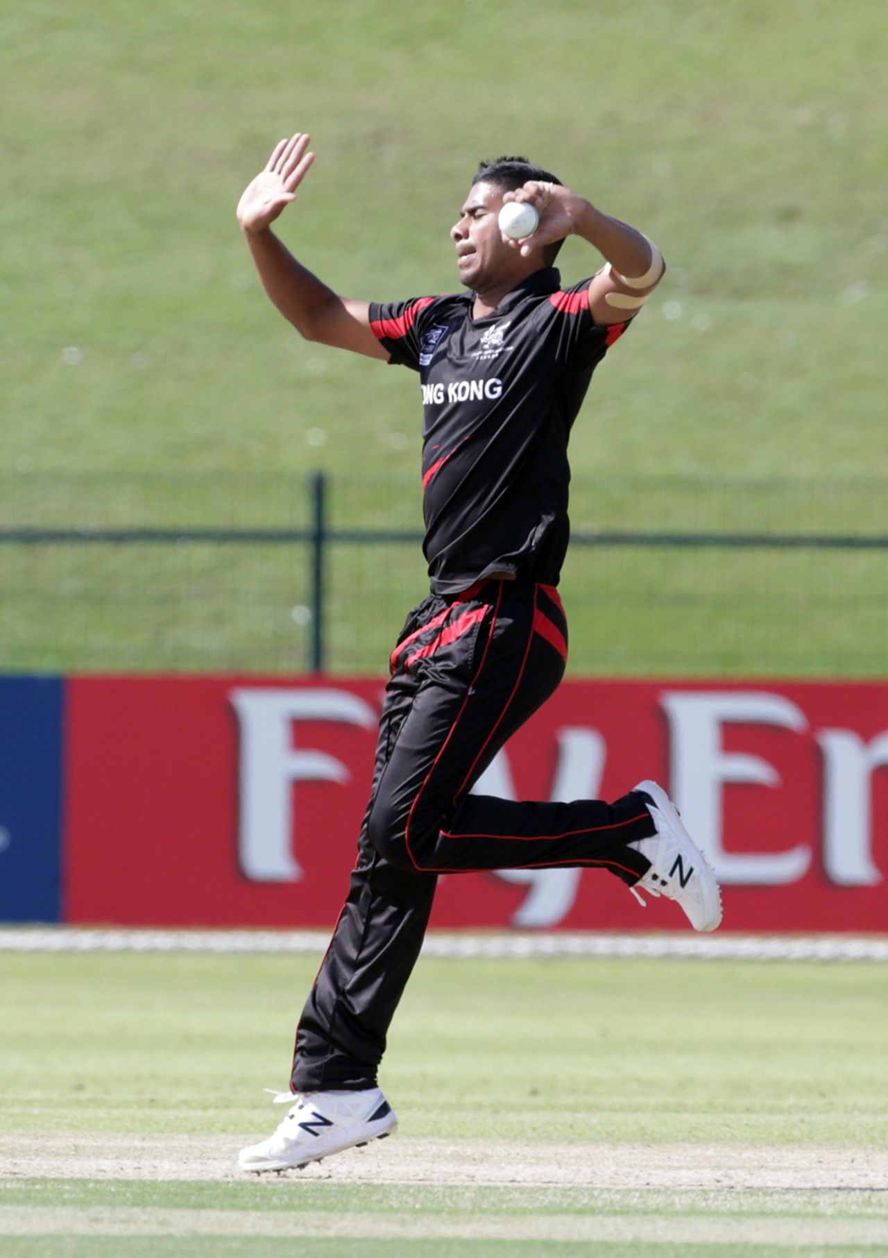 Nadeem Ahmed of Hong Kong bowling during the Hong Kong v Nepal Quarter Final match 60 at the ICC World Twenty20 Qualifiers at the Zayed Cricket Stadium on November 27, 2013 in Abu Dhabi, United Arab Emirates. (Photo by Graham Crouch-IDI/IDI via Getty Images)