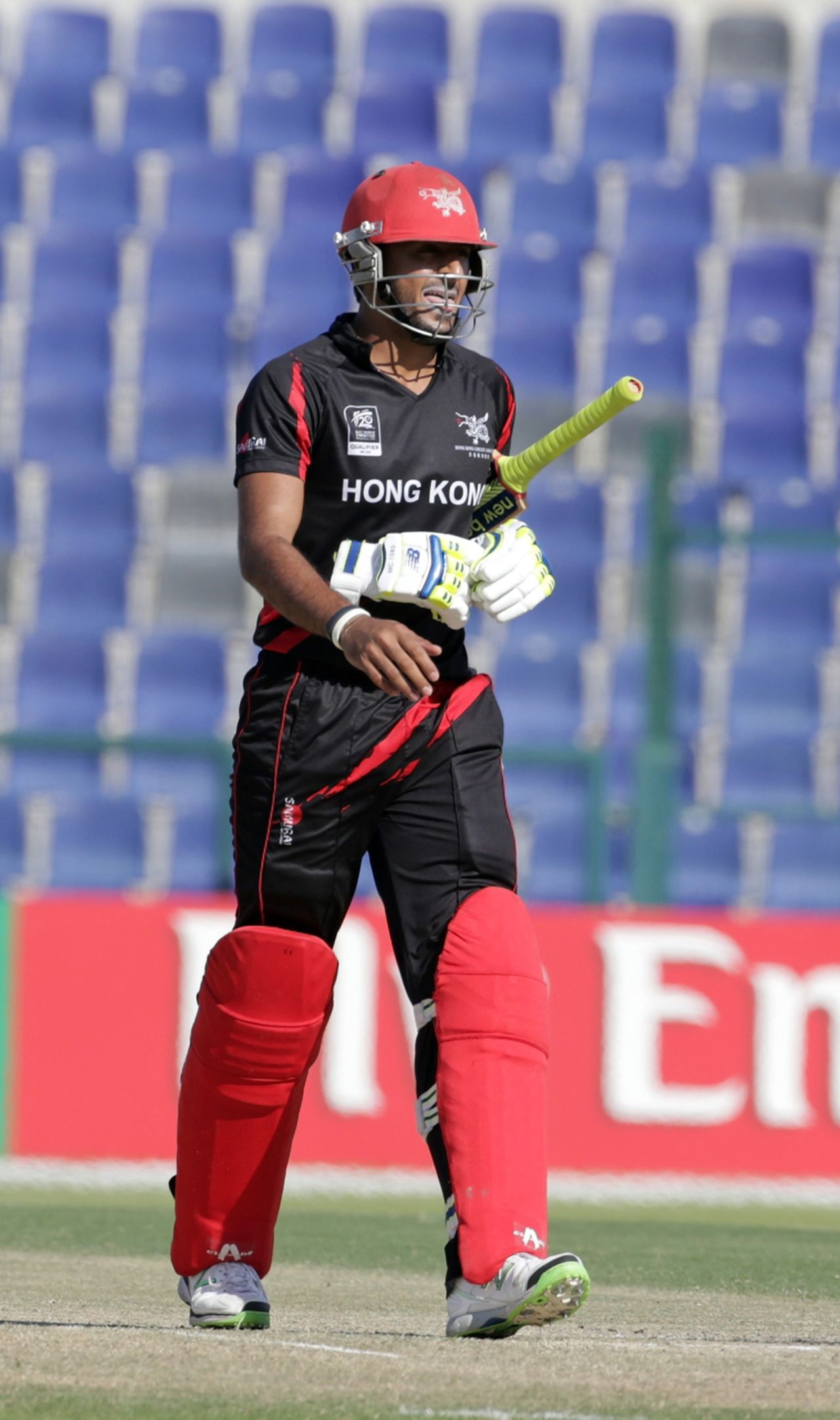 Nizakat Khan of Hong Kong after being dismissed during the Qualifying Play-off match 64 between Papua New Guinea and Hong Kong at the ICC World Twenty20 Qualifiers at the Zayed Cricket Stadium on November 28, 2013 in Abu Dhabi, United Arab Emirates. (Photo by Graham Crouch-IDI/IDI via Getty Images)