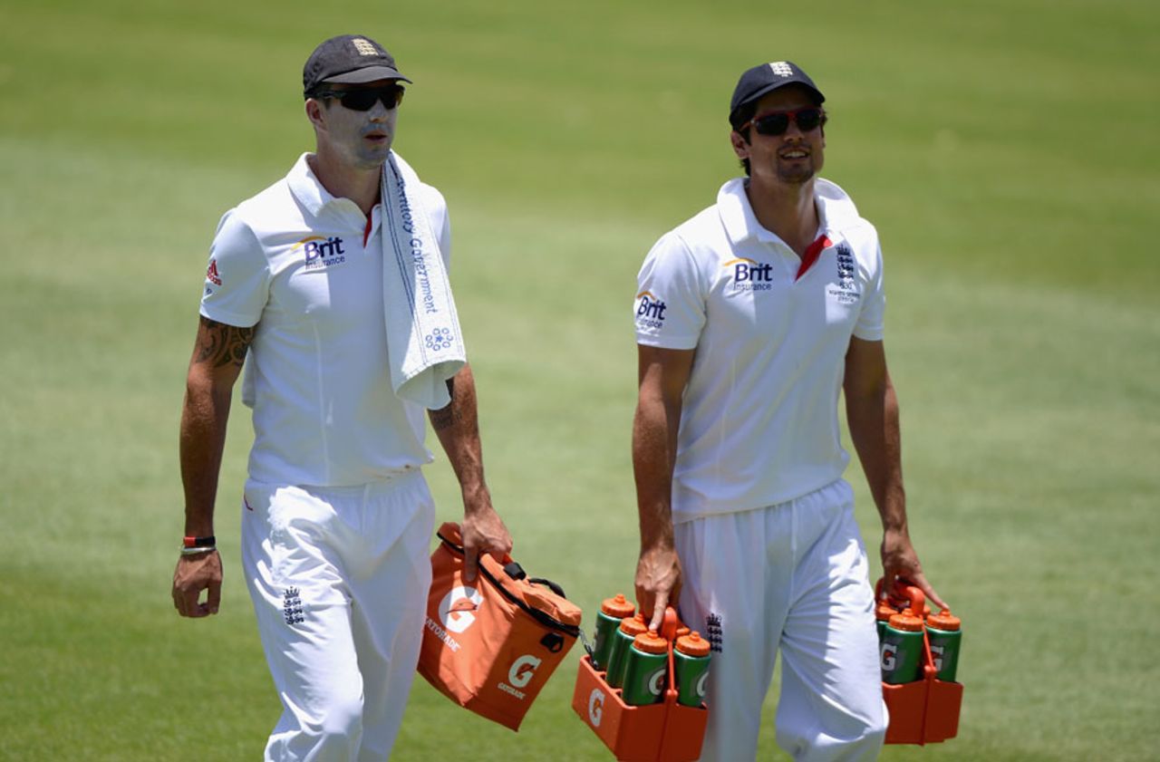 Kevin Pietersen and Alastair Cook bring 198 Test caps-worth of experience to carrying the drinks, CA Chairman's XI v England XI, Tour match, Alice Springs, 2nd day, November 30, 2013