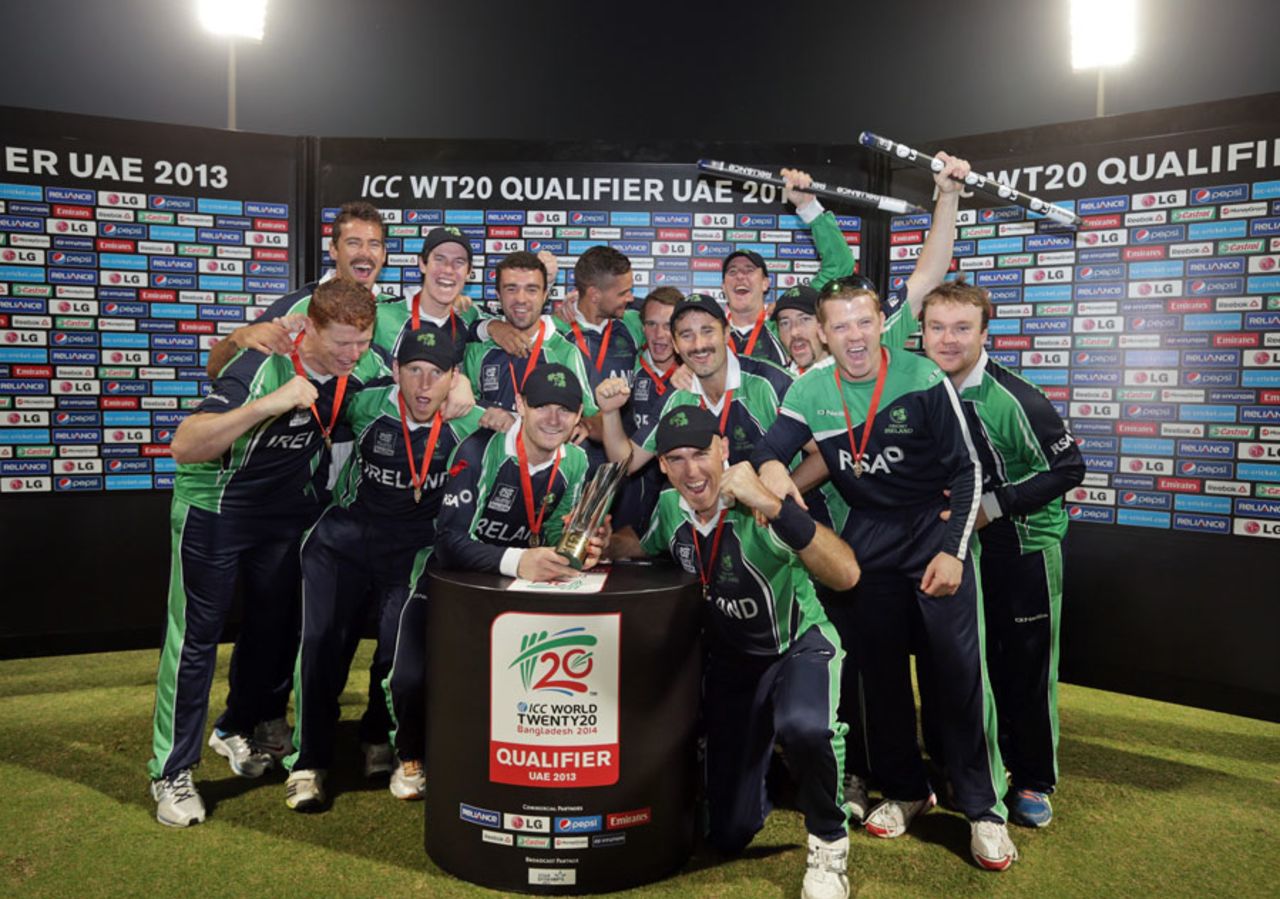 The Ireland players celebrate with the World Twenty20 Qualifiers trophy, Afghanistan v Ireland, ICC World Twenty20 Qualifiers, final, Abu Dhabi, November 30, 2013