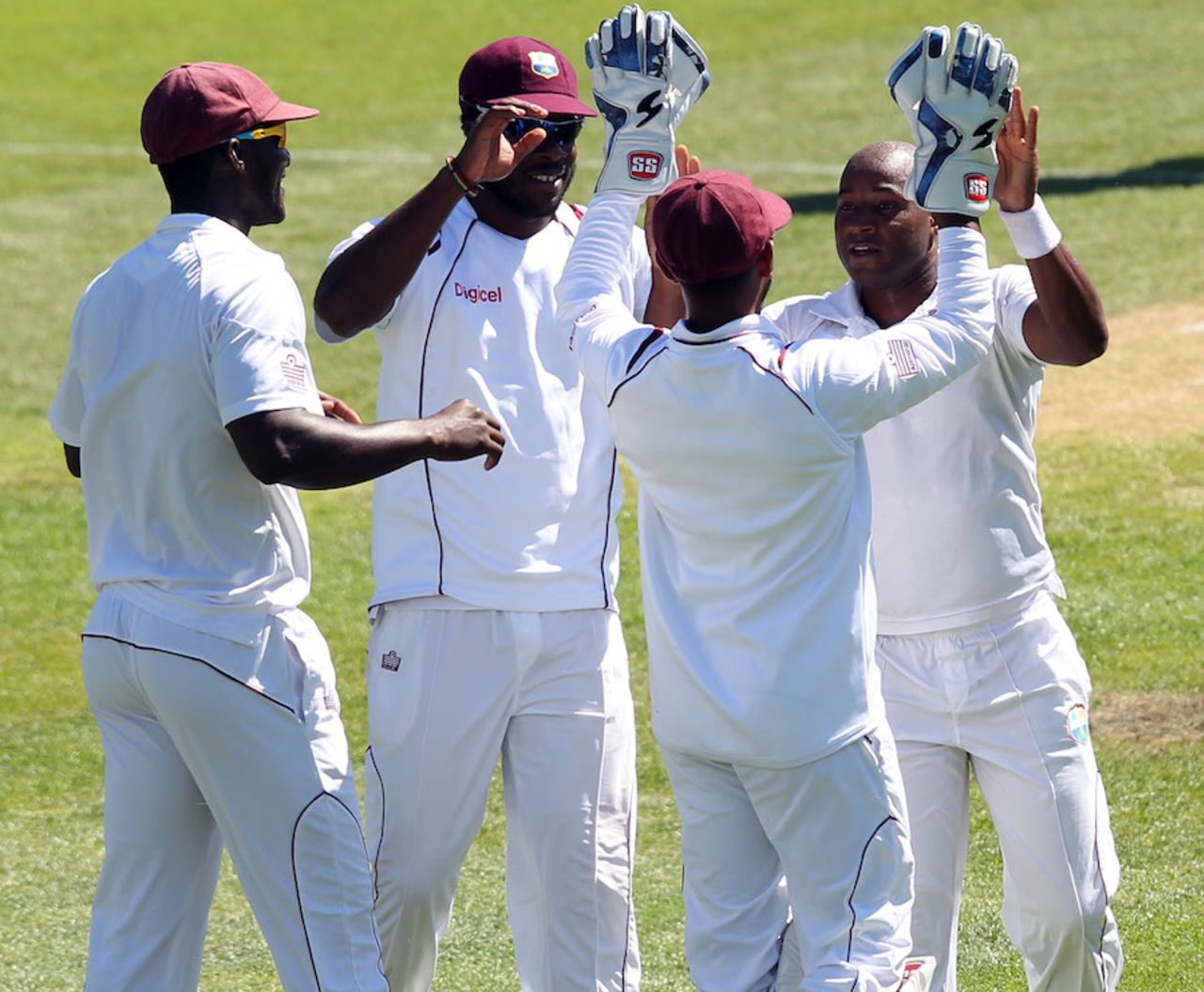 West Indies players congratulate Tino Best after the wicket of Corey Anderson, New Zealand v West Indies, 1st Test, Dunedin, 2nd day, December 4, 2013
