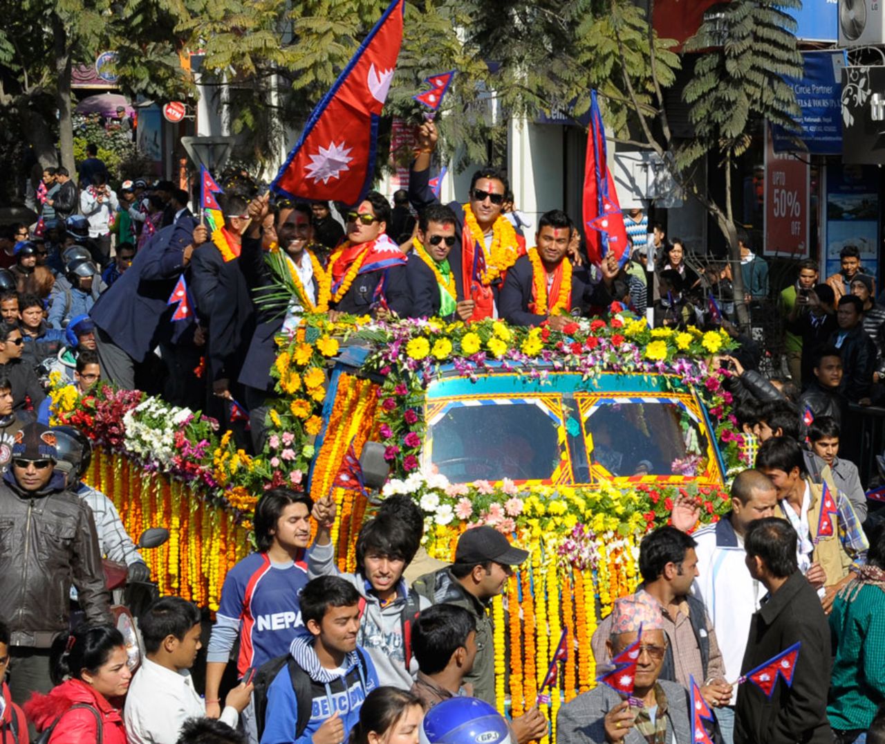 The Nepalese players return after a victorious ICC World Twenty20 Qualifier campaign, Kathmandu, December 4, 2013