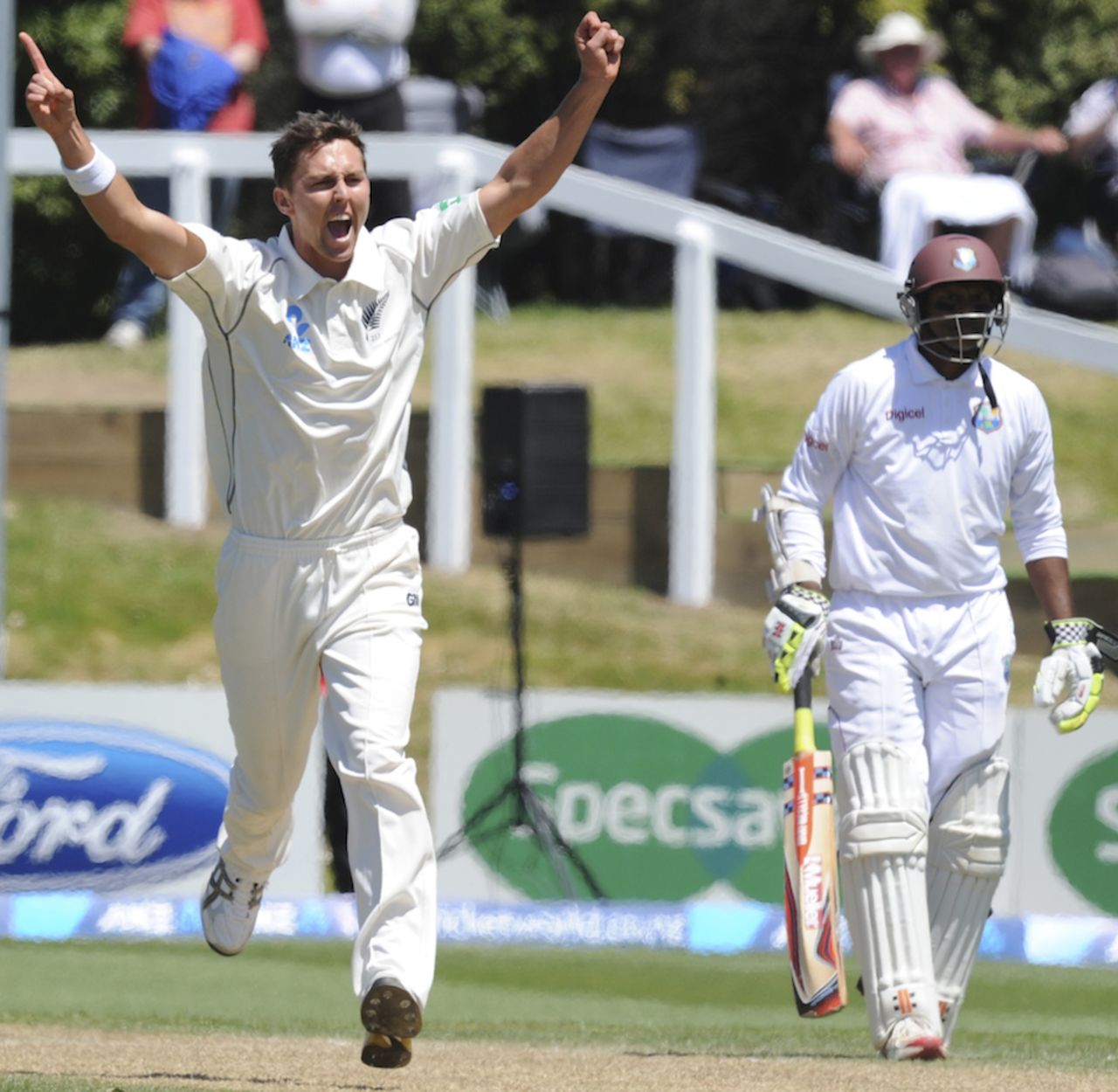 Trent Boult raises his arms after picking up a wicket, New Zealand v West Indies, 1st Test, Dunedin, 3rd day, December 5, 2013
