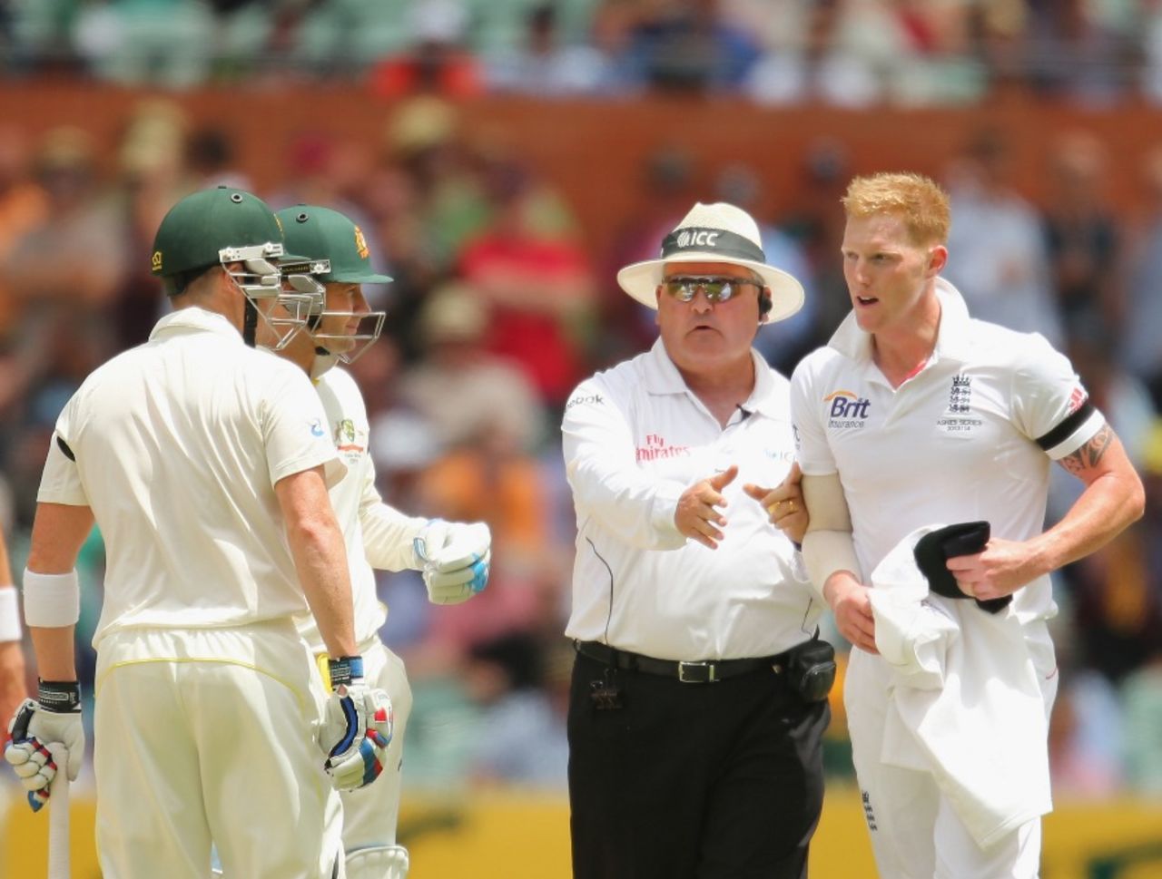 Umpire Marais Erasmus steps in to ensure the confrontation between Ben Stokes and Brad Haddin does not become too heated, Australia v England, 2nd Test, Adelaide, 2nd day, December 6, 2013