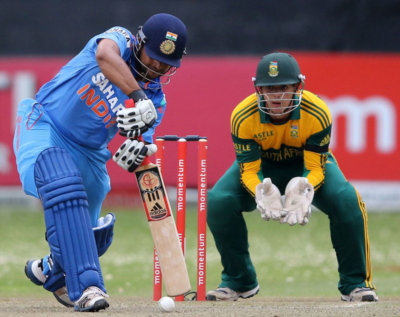 Suresh Raina drives through the off side, South Africa v India, 2nd ODI, Durban, December 8, 2013