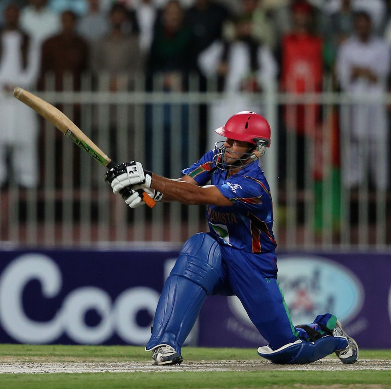 Najibullah Zadran sweeps one powerfully, Afghanistan v Pakistan, only T20, Sharjah, December 8, 2013