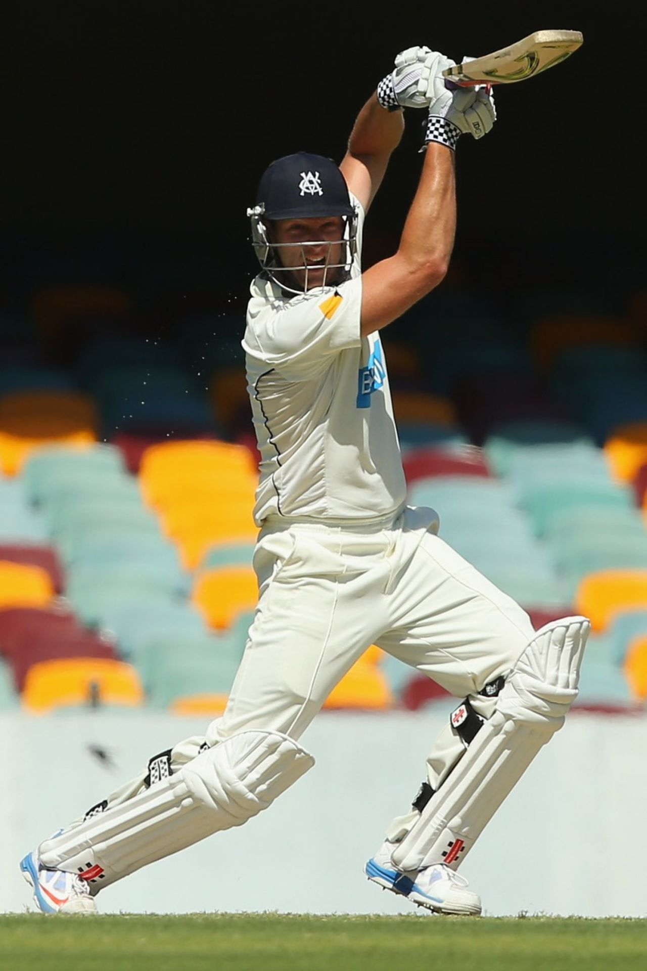 Cameron White drives through the off side, Queensland v Victoria, Sheffield Shield, Brisbane, 2nd day, December 9, 2013