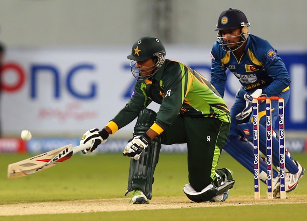 Sharjeel Khan sweeps during his cameo, Pakistan v Sri Lanka, 1st T20I, Dubai, December 11, 2013