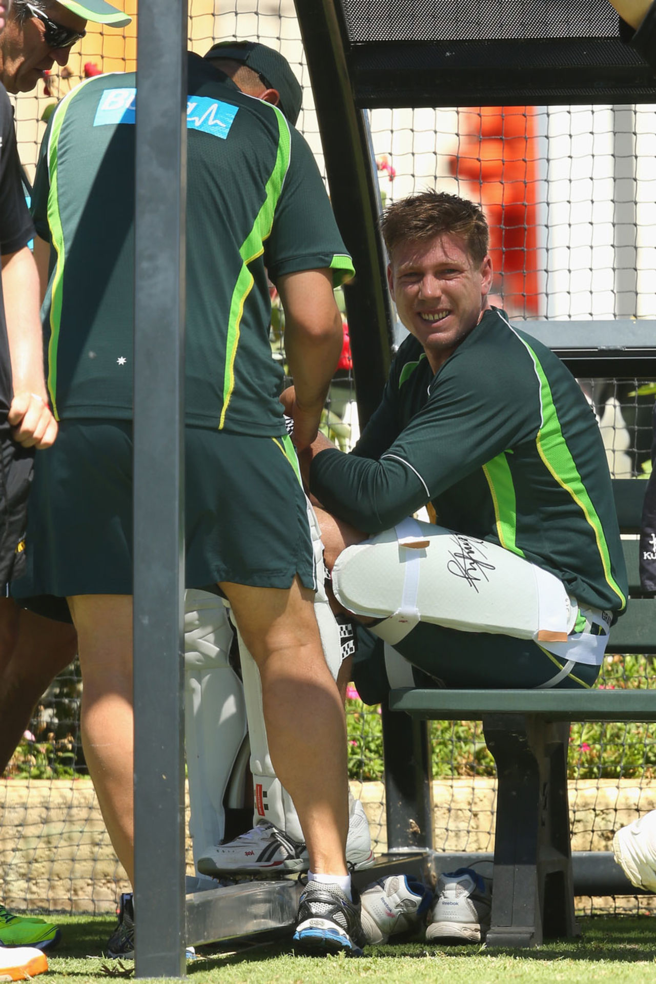 James Faulkner receives attention after being struck on the hand during practice, Australia v England, 3rd Test, Perth, December 12, 2013