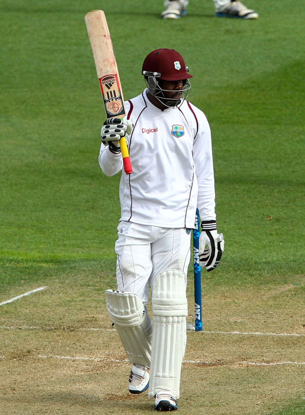 Kirk Edwards raises his bat after scoring a half-century, New Zealand v West Indies, 2nd Test, Wellington, 2nd day, December 12, 2013