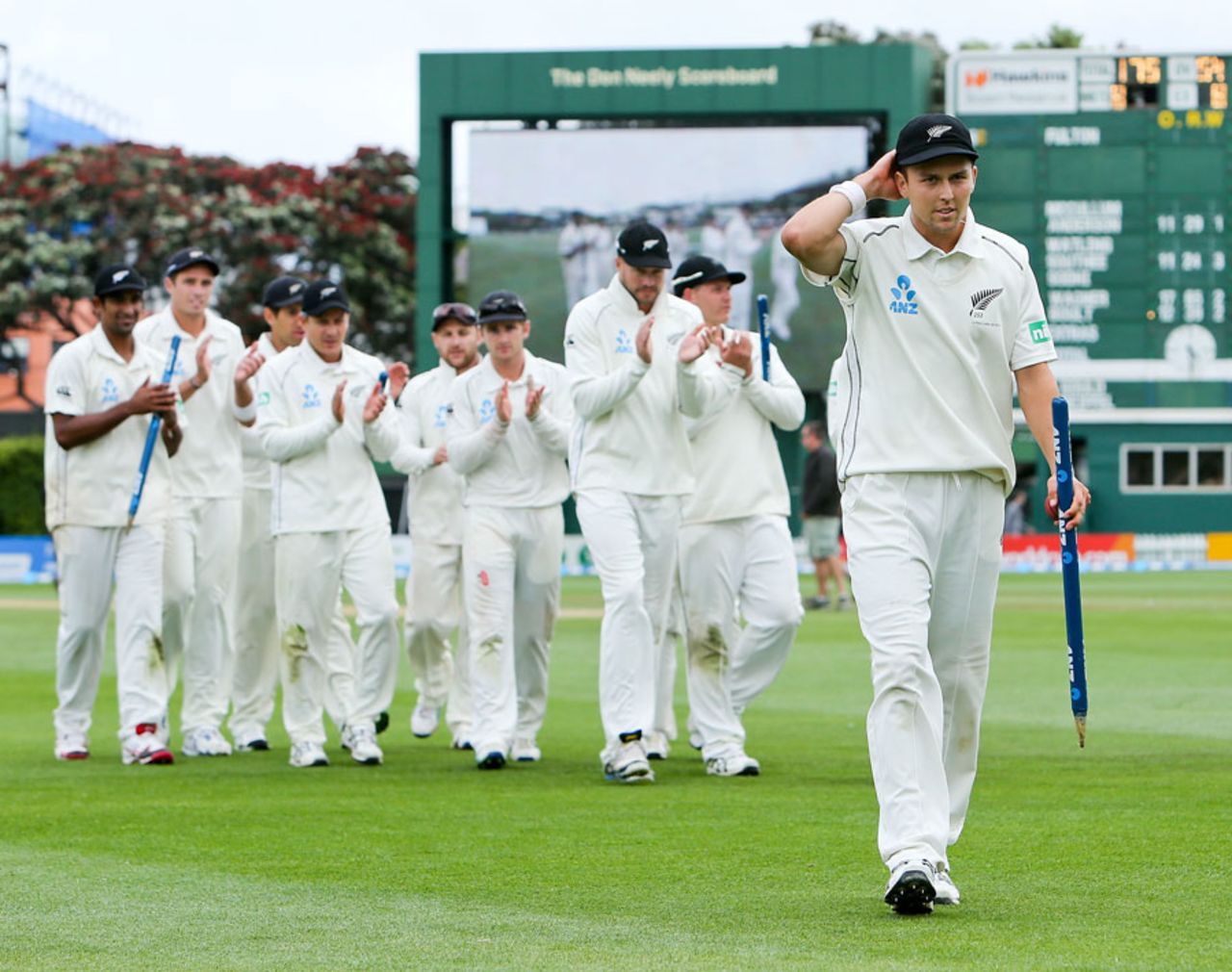 Trent Boult leads New Zealand off the field after their innings victory, New Zealand v West Indies, 2nd Test, Wellington, 3rd day, December 13, 2013