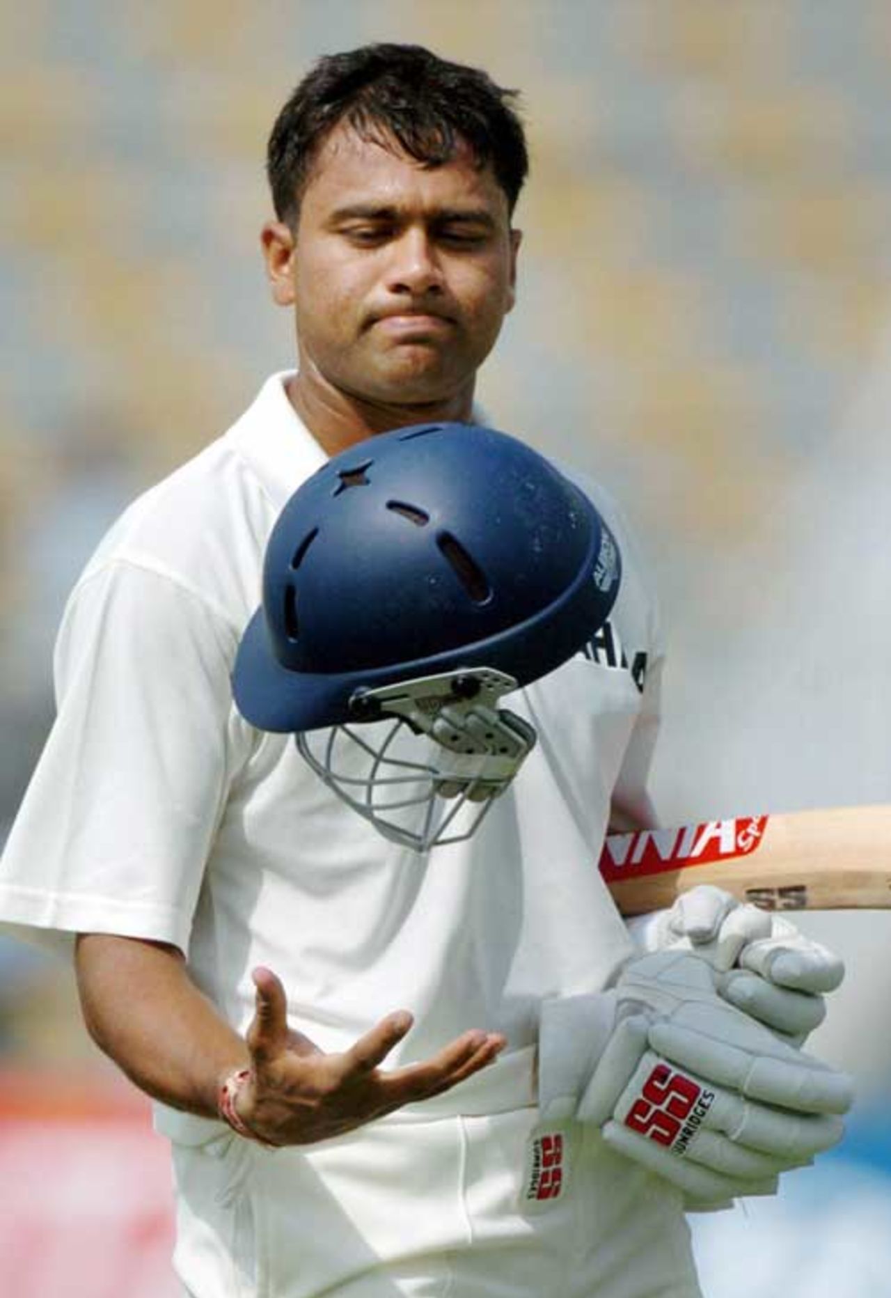 Aakash Chopra tosses his helmet after being dismissed, Pakistan v India, 2nd Test, Lahore, 3rd day, April 7, 2004