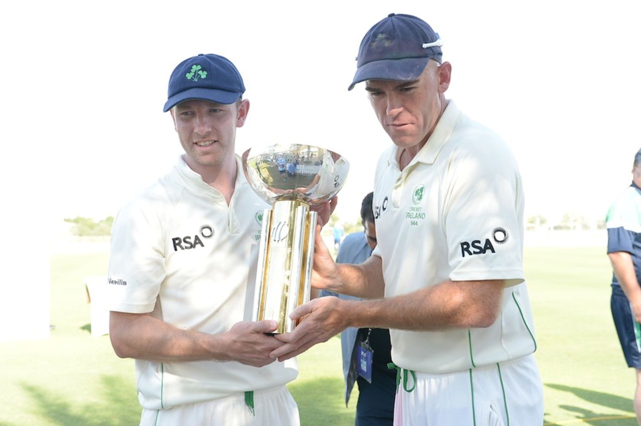 Andrew White and Trent Johnston pose with the trophy after the win, Afghanistan v Ireland, Intercontinental Cup final, Dubai, 4th day, December 13, 2013