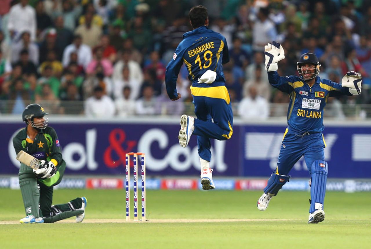 Sachithra Senanayake leaps after dismissing Ahmed Shehzad, Pakistan v Sri Lanka, 2nd T20, Dubai, December 13, 2013