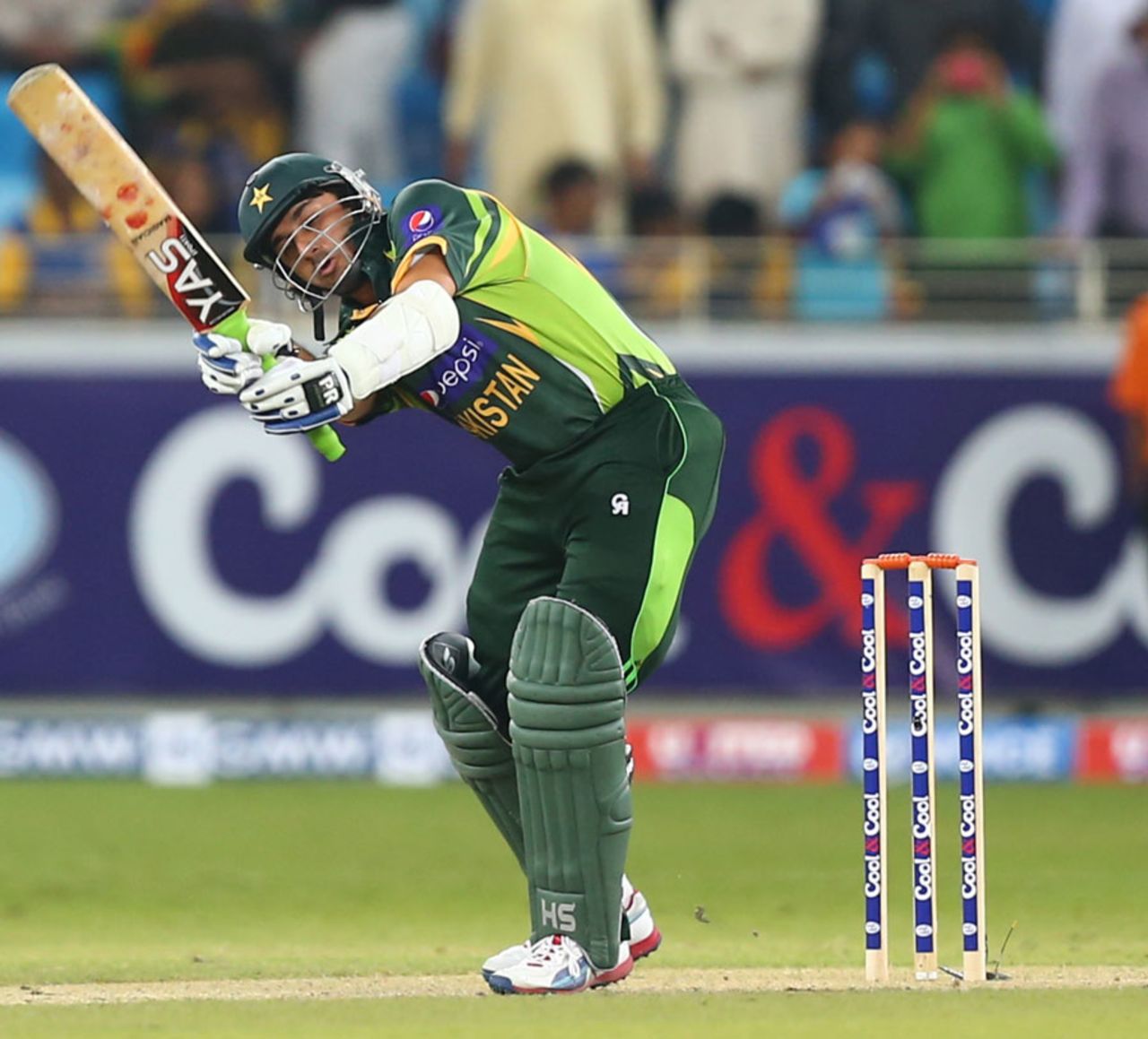Saeed Ajmal flicks one behind to fine leg, Pakistan v Sri Lanka, 2nd T20, Dubai, December 13, 2013