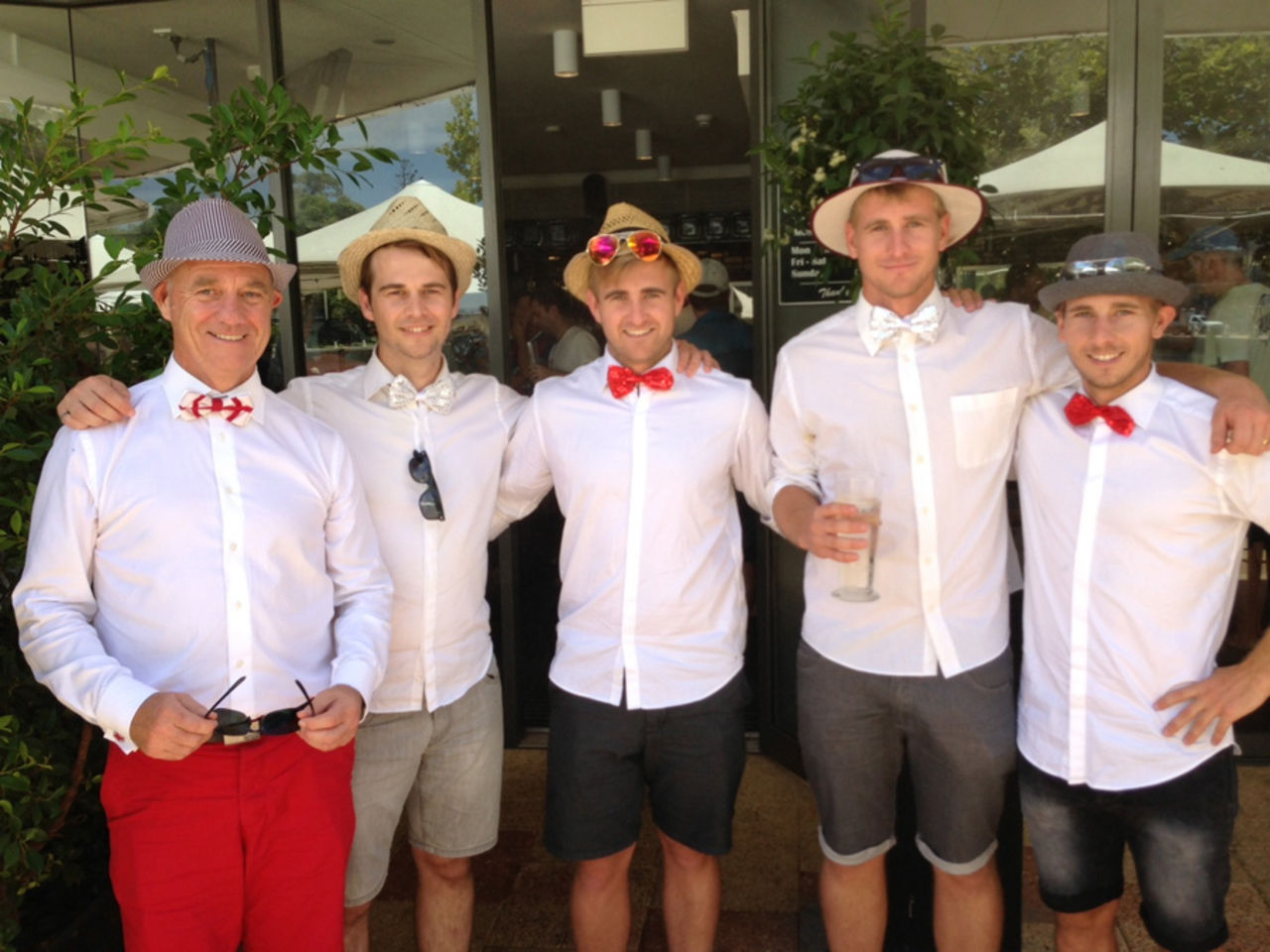 Spectators dressed in bow ties, Perth, December 14, 2013