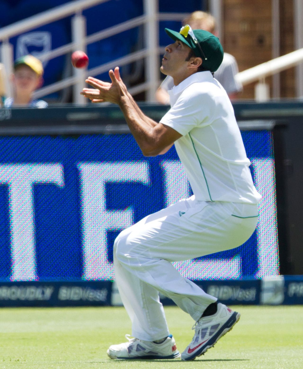 Imran Tahir steadies himself for a catch, South Africa v India, 1st Test, Johannesburg, 1st day, December 18, 2013