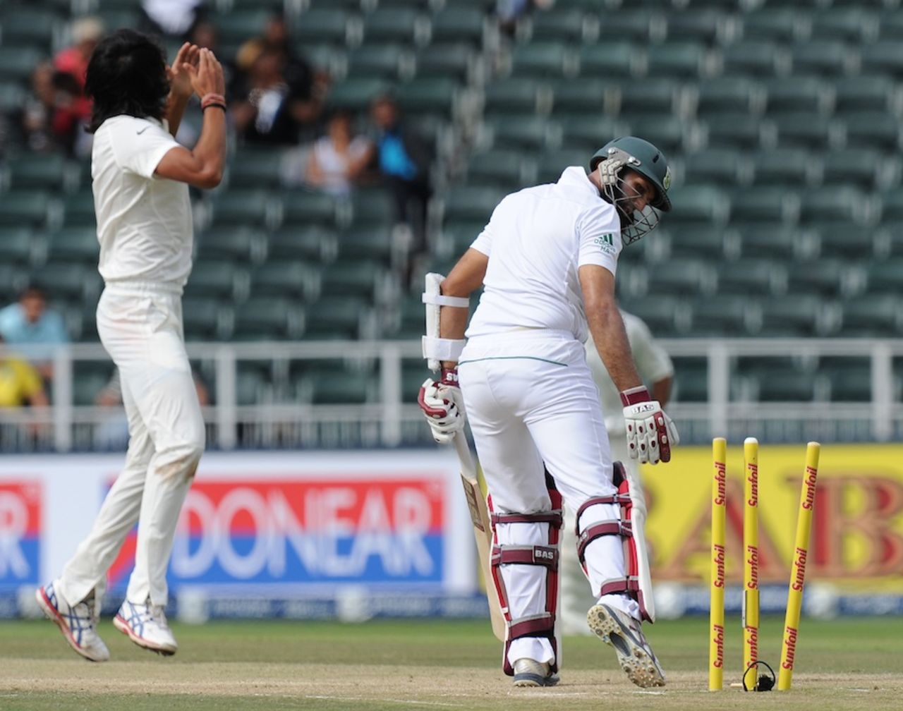 Hashim Amla is bowled by Ishant Sharma, South Africa v India, 1st Test, Johannesburg, 2nd day, December 19, 2013