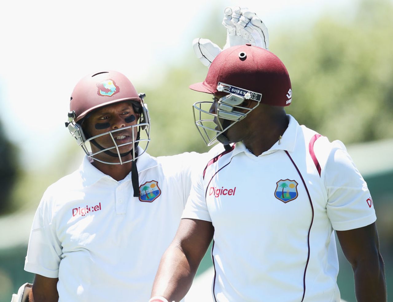 Shivnarine Chanderpaul congratulates Tino Best on a job well done, New Zealand v West Indies, 3rd Test, Hamilton, 2nd day, December 20, 2013