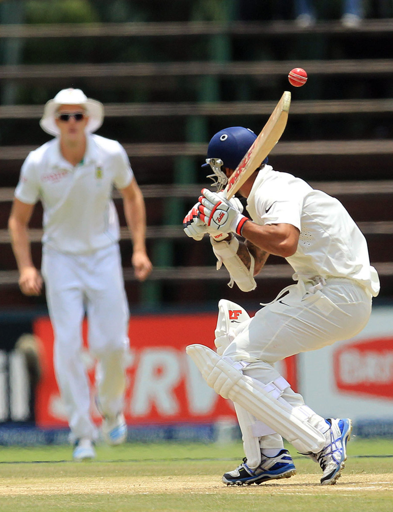 Shikhar Dhawan ducks under a bouncer, South Africa v India, 1st Test, Johannesburg, 3rd day, December 20, 2013
