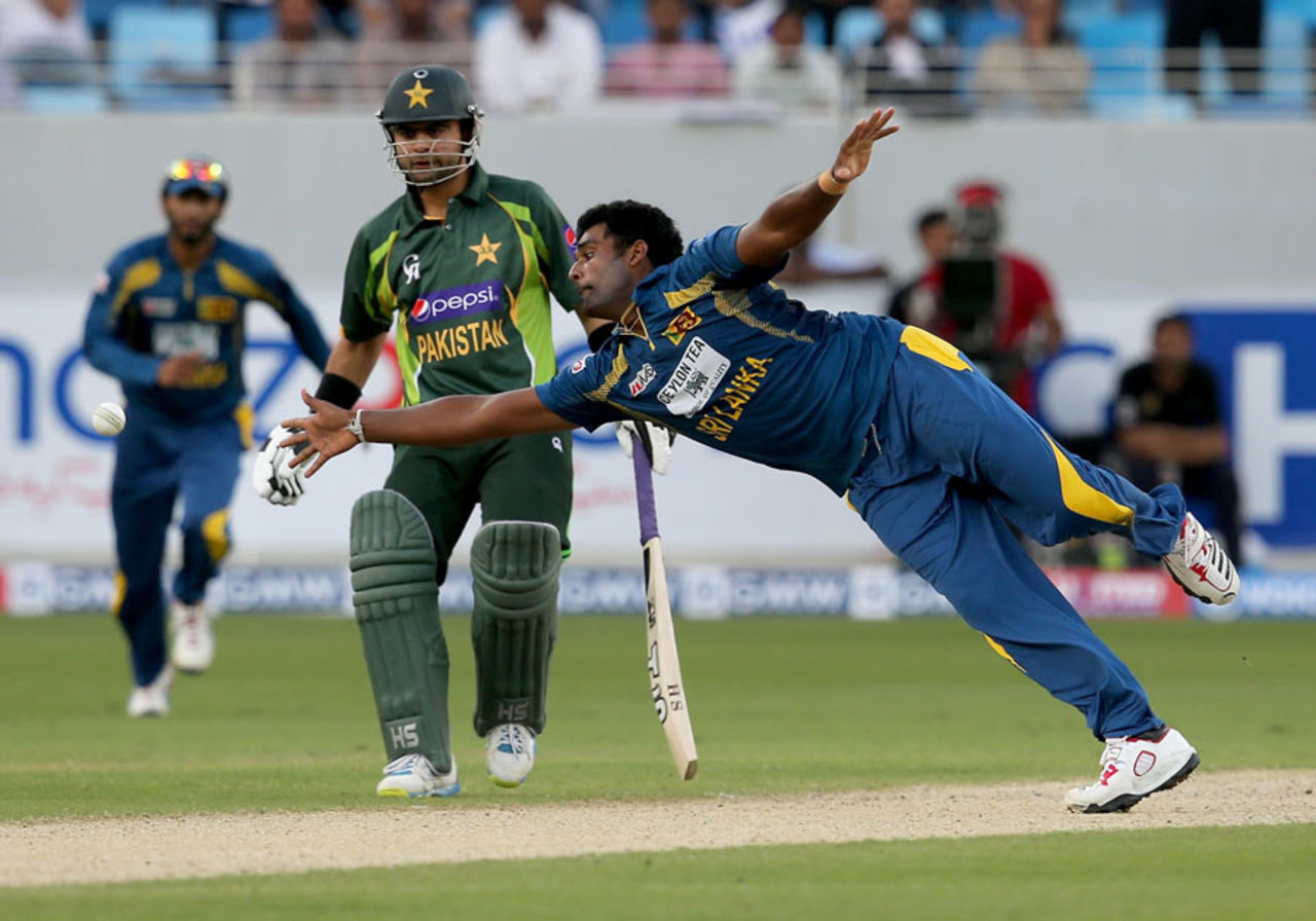Thisara Perera stretches to stop the ball, Pakistan v Sri Lanka, 2nd ODI, Dubai, December 20, 2013
