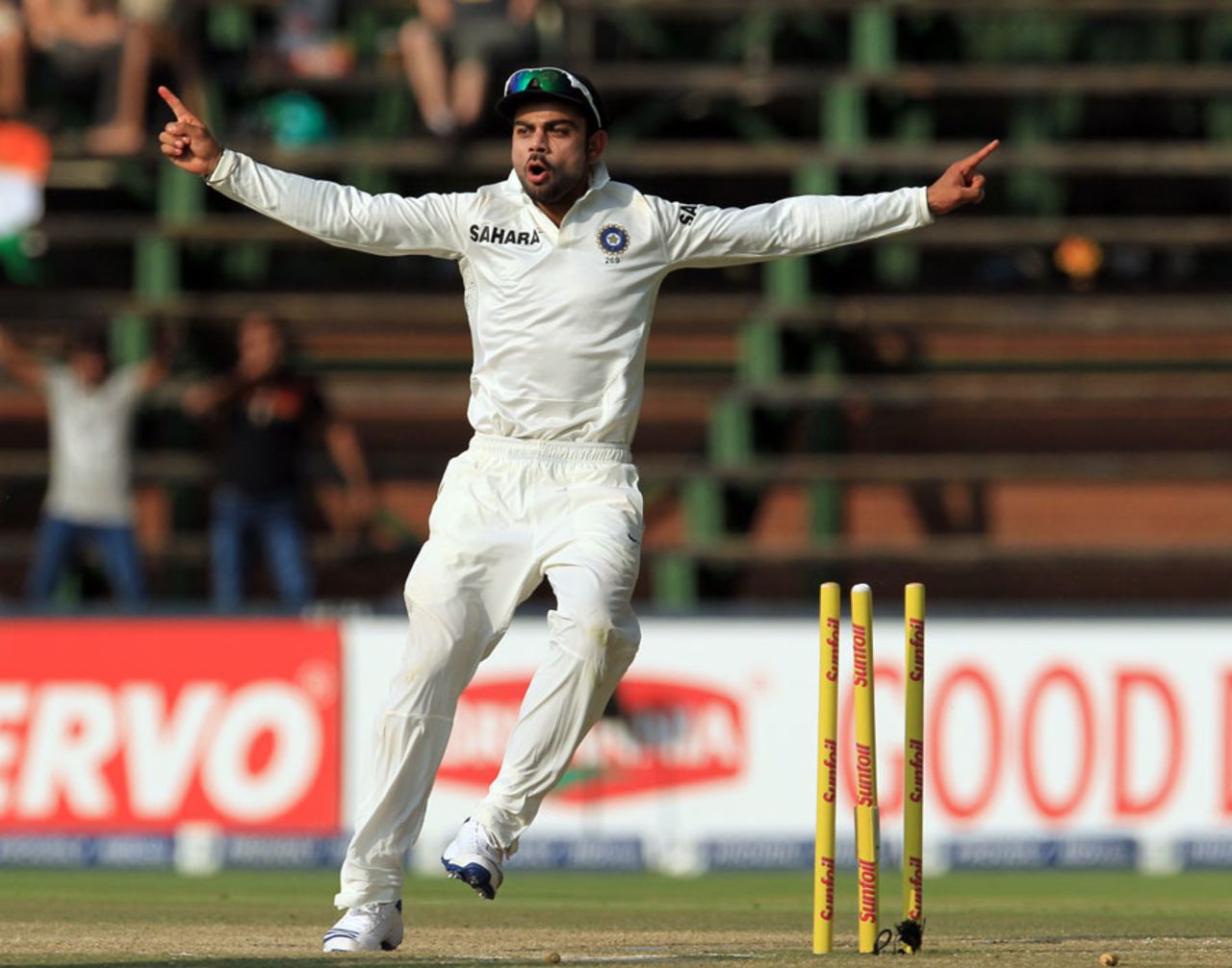 Virat Kohli celebrates Graeme Smith's run-out, South Africa v India, 1st Test, Johannesburg, 4th day, December 21, 2013