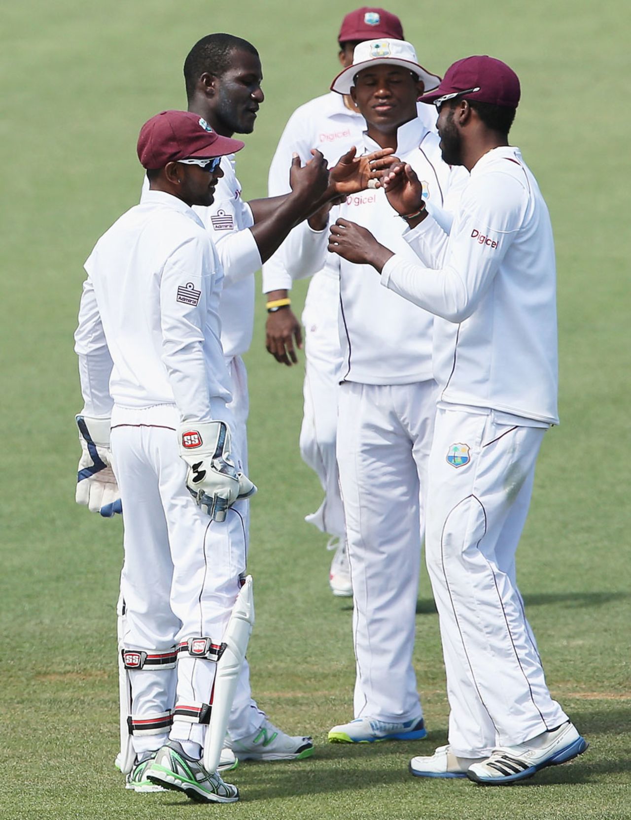 The West Indians celebrate a wicket, New Zealand v West Indies, 3rd Test, Hamilton, 4th day, December 22, 2013