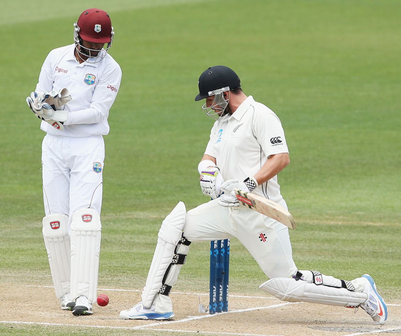 Hamish Rutherford kicks away a ball from his stumps, New Zealand v West Indies, 3rd Test, Hamilton, 4th day, December 22, 2013