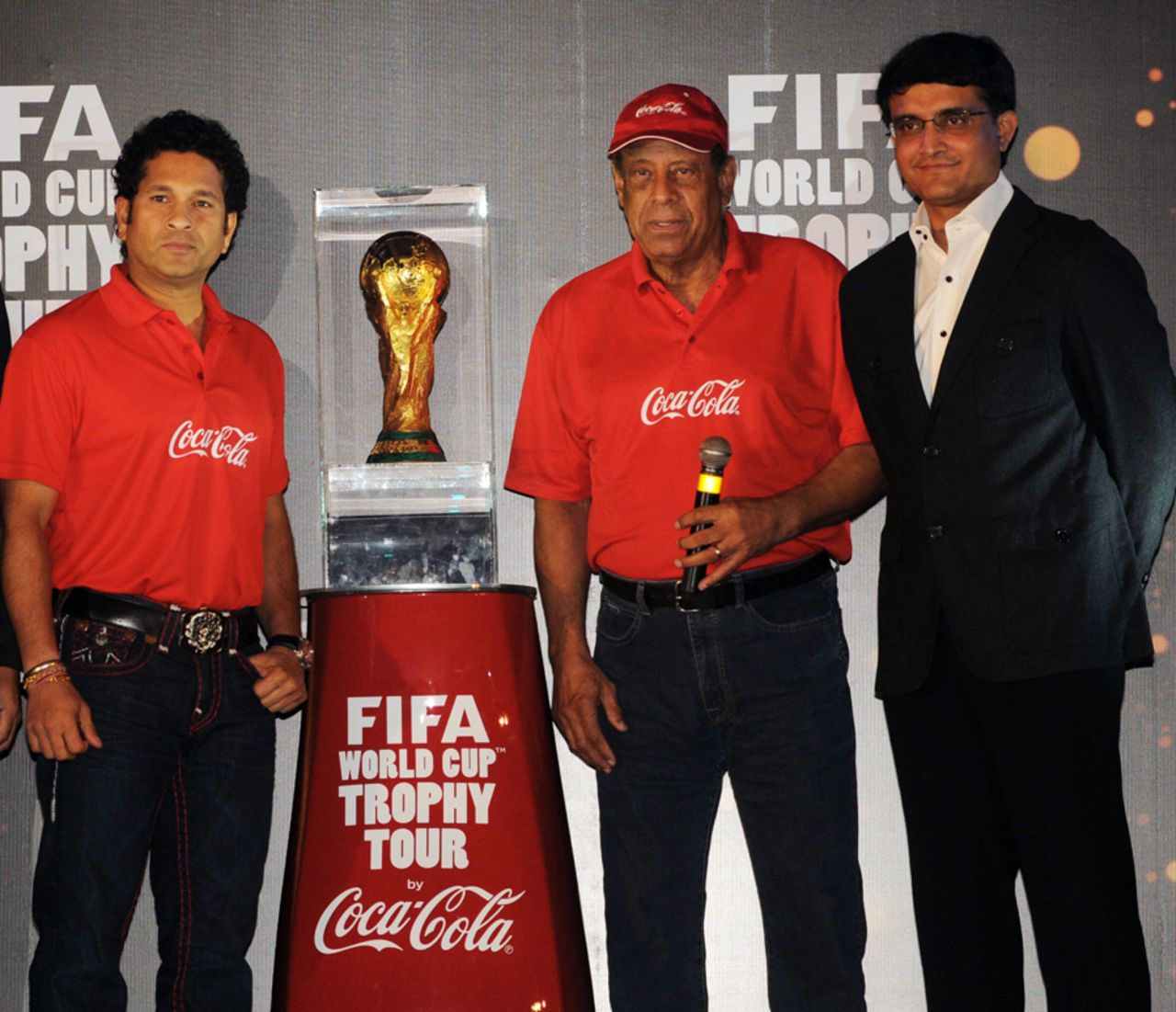 Sachin Tendulkar and Sourav Ganguly, with former Brazil football captain Carlos Alberto Torres and the FIFA World Cup, Kolkata, December 22, 2013
