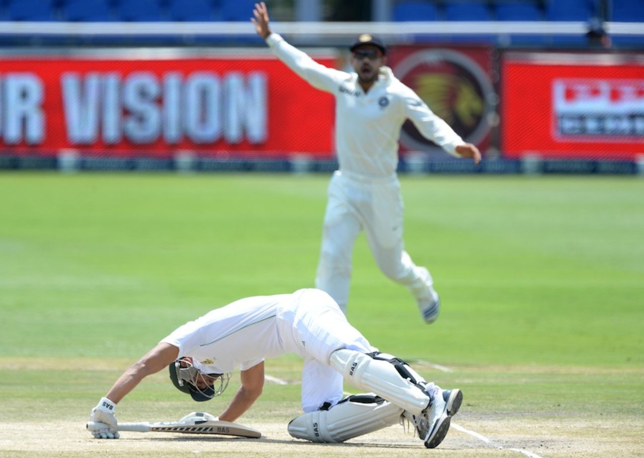 Alviro Petersen falls to the ground, South Africa v India, 1st Test, Johannesburg, 5th day, December 22, 2013