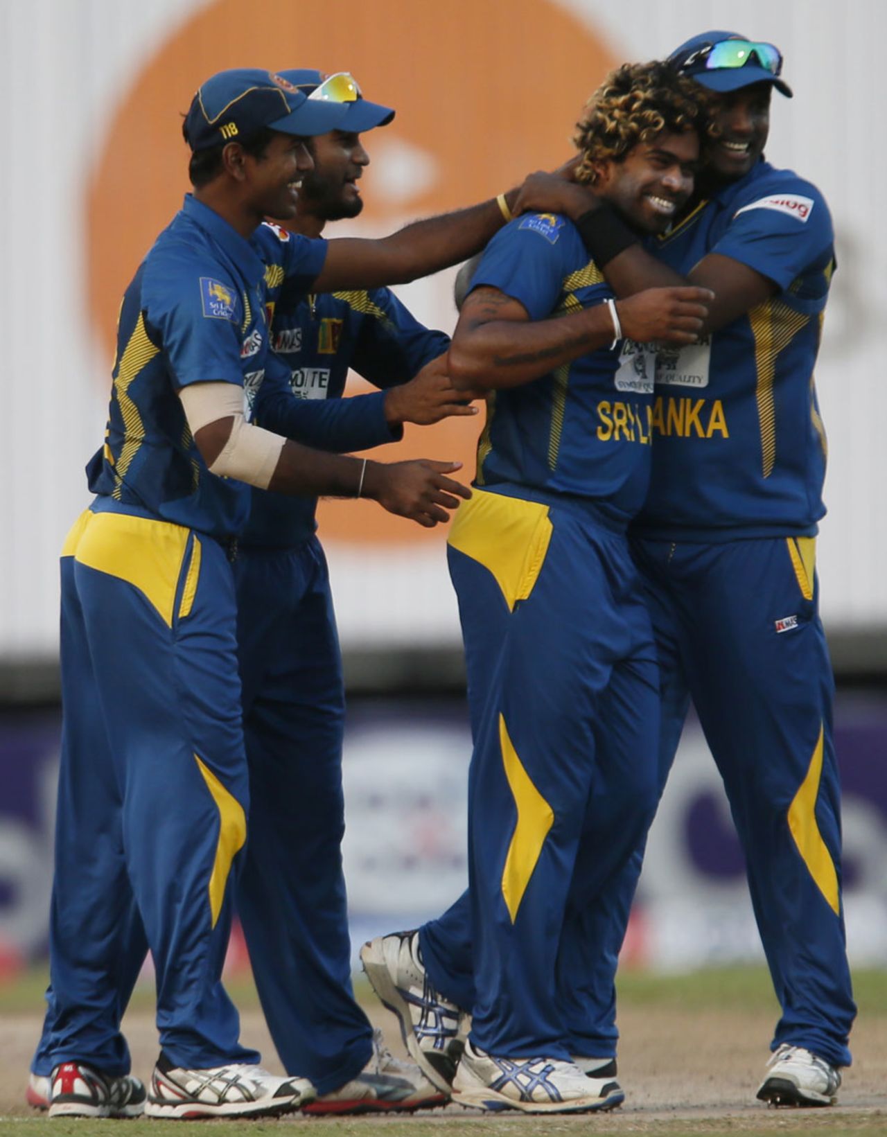 The Sri Lankan players celebrate a wicket, Pakistan v Sri Lanka, 3rd ODI, Sharjah, December 22, 2013