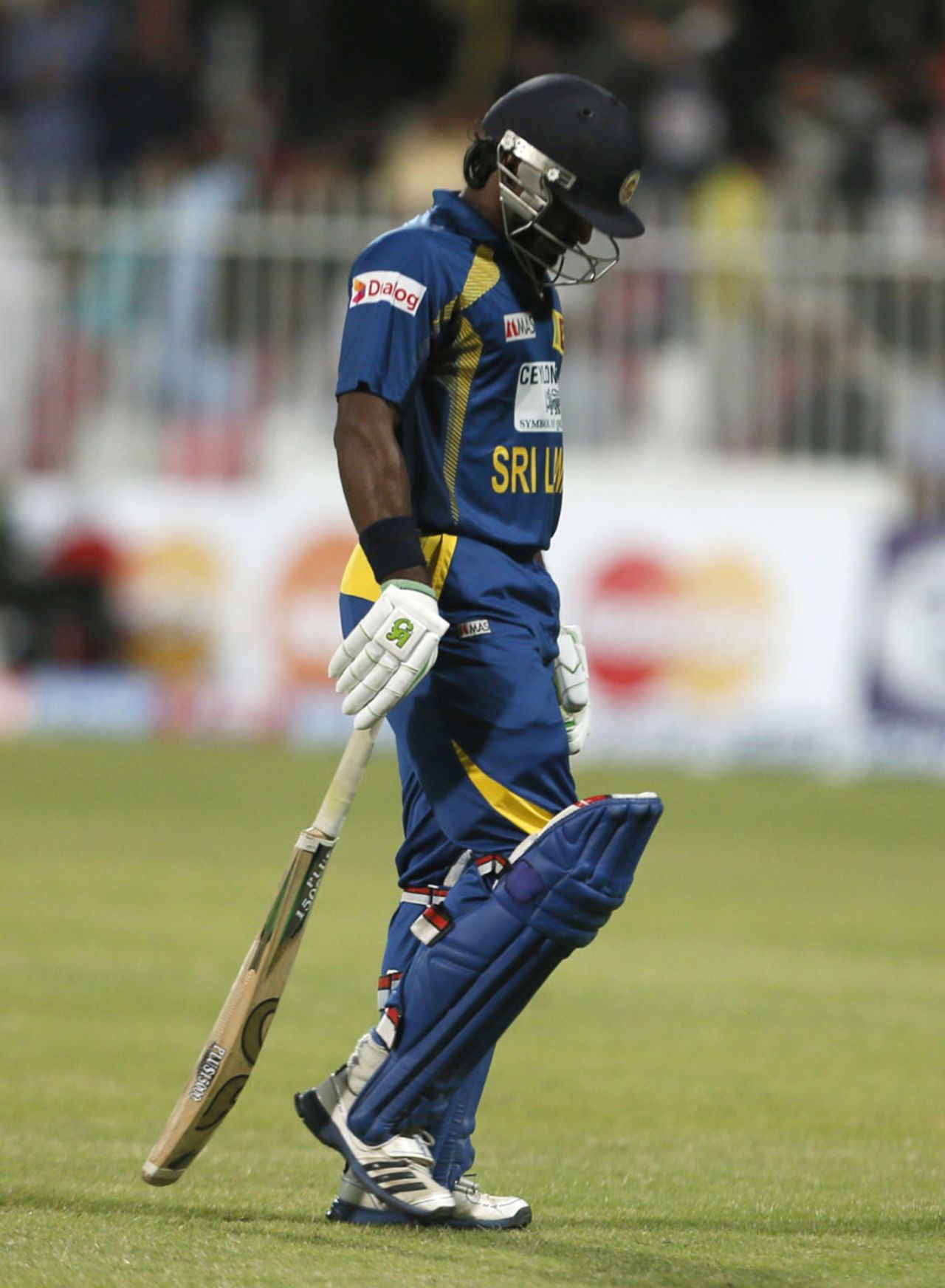 Dimuth Karunaratne walks back for a duck, Pakistan v Sri Lanka, 3rd ODI, Sharjah, December 22, 2013