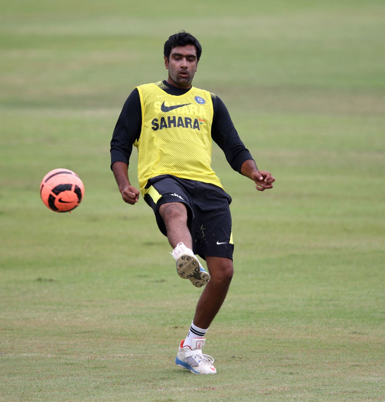 R Ashwin kicks about with a football during a practice session, Durban, December 24, 2013