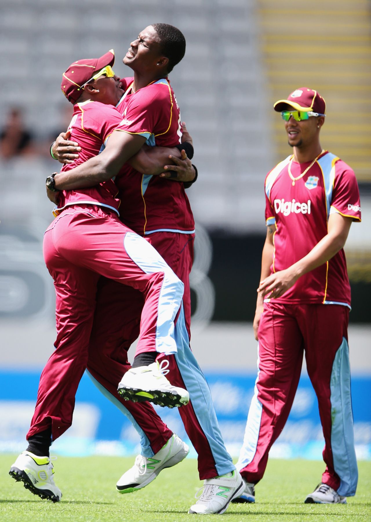 Jason Holder gets a hug from his captain, Dwayne Bravo, New Zealand v West Indies, 1st ODI, Auckland, December 26, 2013