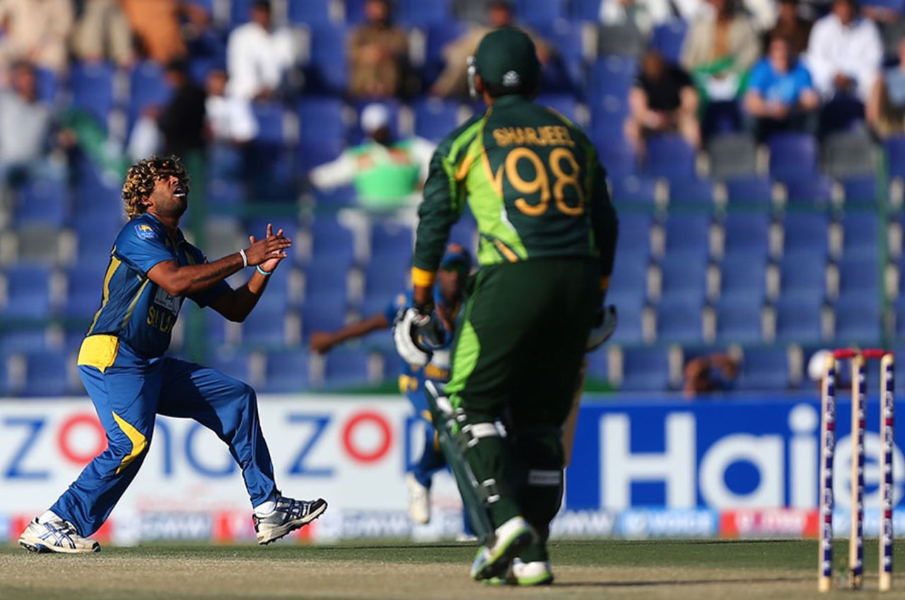 Lasith Malinga takes a return catch to dismiss Sharjeel Khan, Pakistan v Sri Lanka, 5th ODI, Abu Dhabi, December 27, 2013