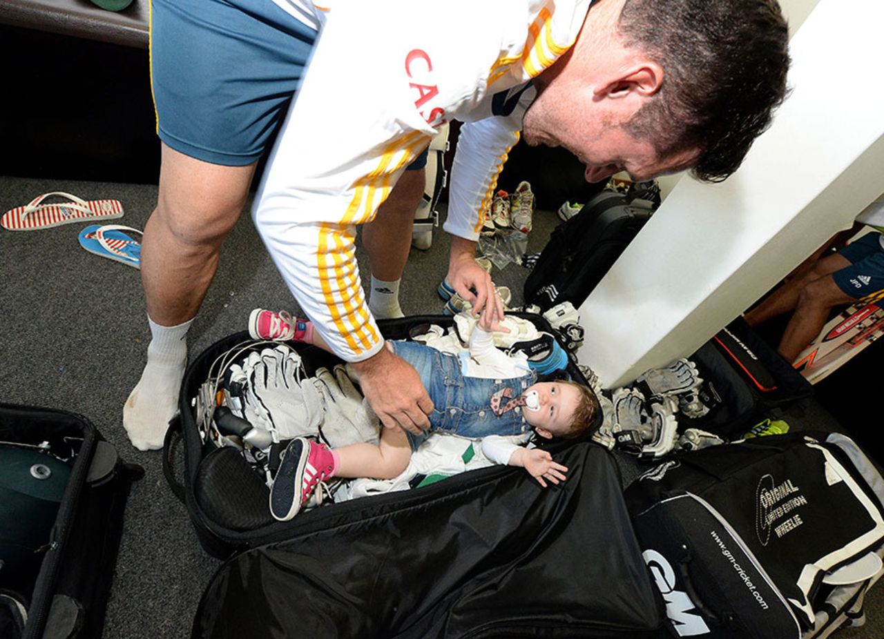Graeme Smith packs his baby boy Carter in his kitbag, South Africa v India, 2nd Test, Durban, 5th day, December 30, 2013