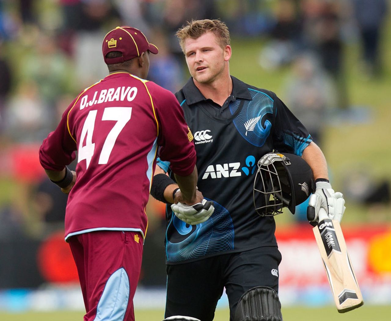 Corey Anderson is congratulated by Dwayne Bravo for his record-breaking ton, New Zealand v West Indies, 3rd ODI, Queenstown, January 1, 2014