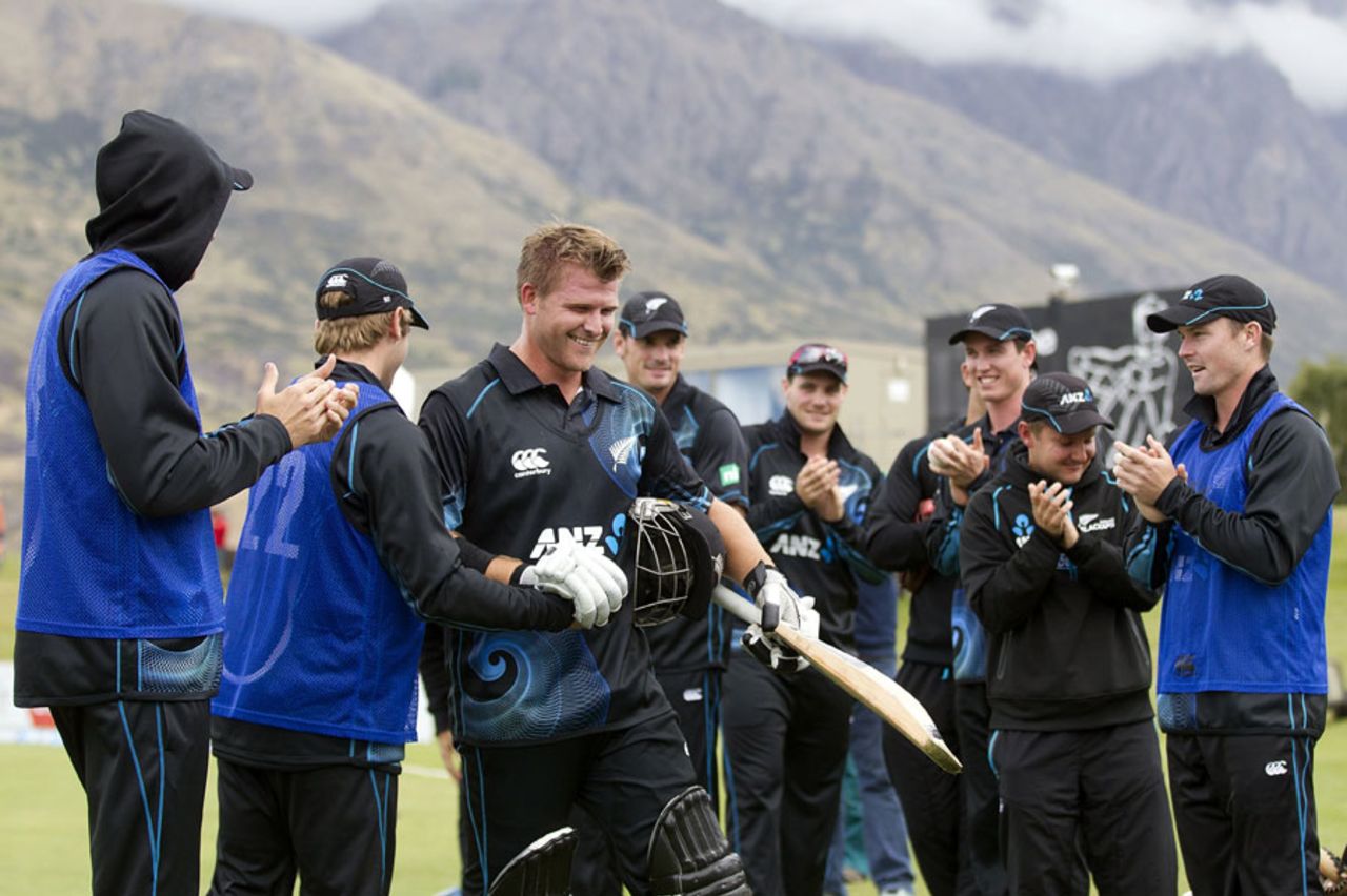 Corey Anderson's team-mates applaud him after his record-breaking effort, New Zealand v West Indies, 3rd ODI, Queenstown, January 1, 2014