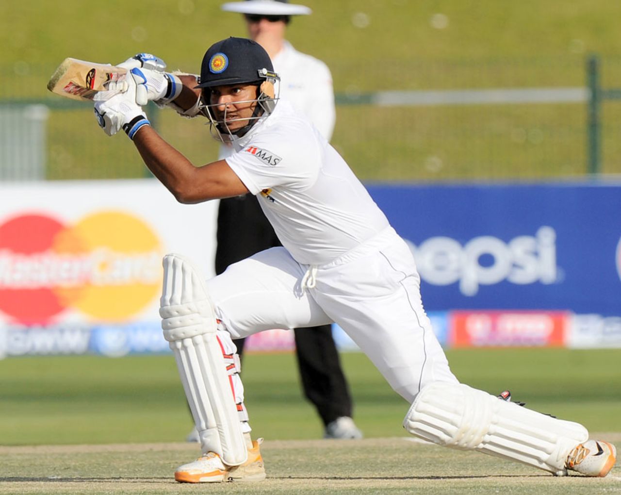 Kumar Sangakkara strokes the ball through the covers, Pakistan v Sri Lanka, 1st Test, Abu Dhabi, 3rd day, January 2, 2014