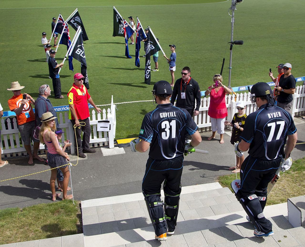 Martin Guptill and Jesse Ryder walk out for the first ball of ODI cricket in Nelson, New Zealand v West Indies, 4th ODI, Nelson, January 4, 2014