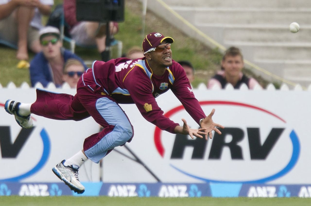 Lendl Simmons charges in but the ball is about to land just short, New Zealand v West Indies, 4th ODI, Nelson, January 4, 2014