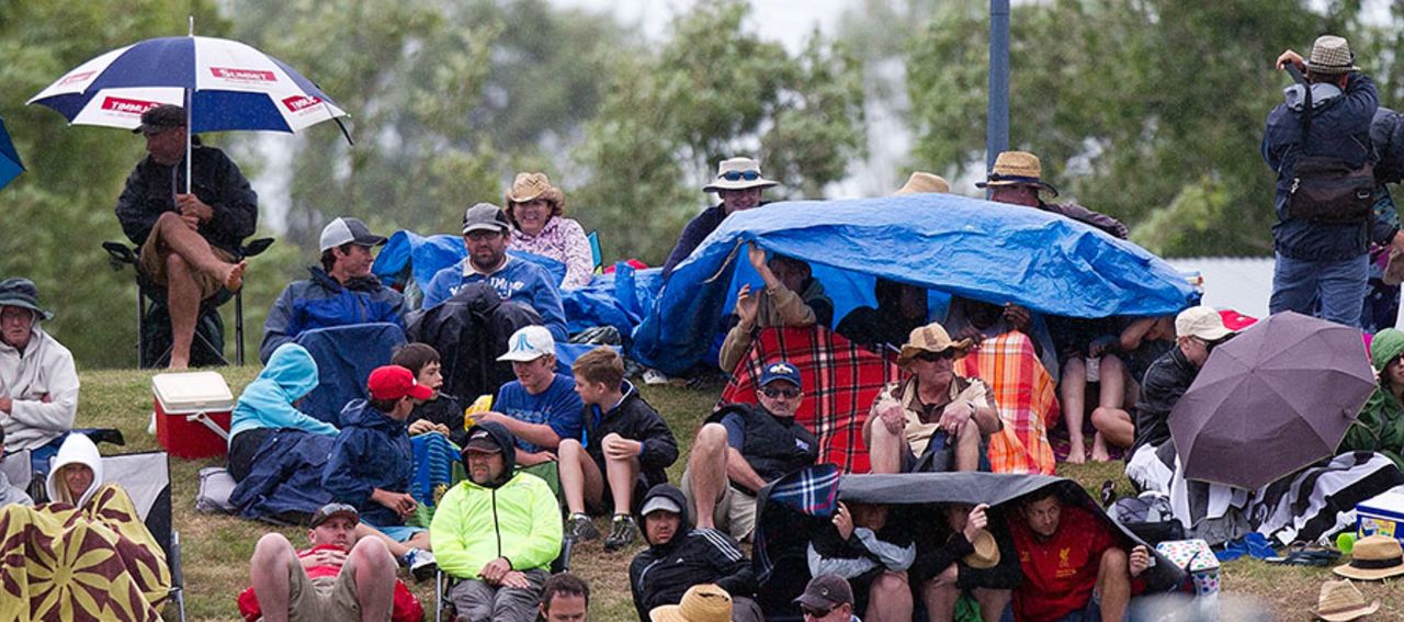 Spectators shelter from the rain at the Saxton Oval, New Zealand v West Indies, 4th ODI, Nelson, January 4, 2014