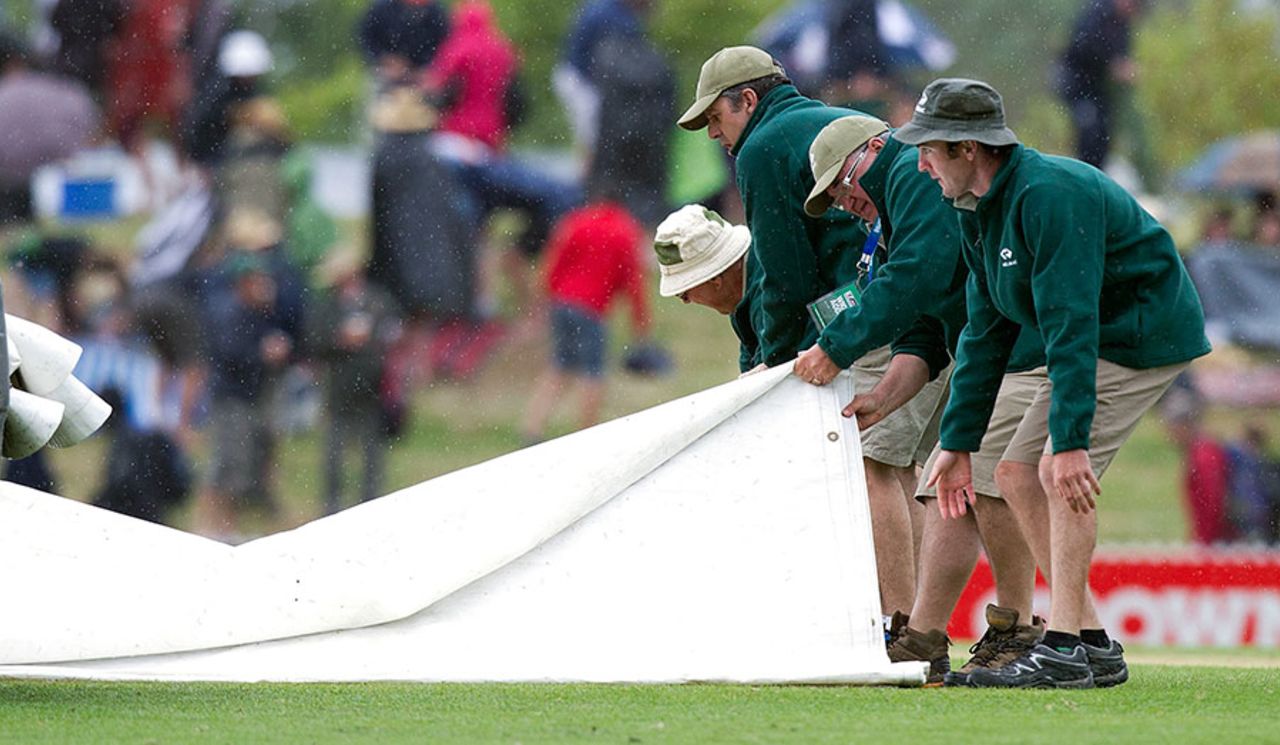 The covers come on at the Saxton Oval, New Zealand v West Indies, 4th ODI, Nelson, January 4, 2014
