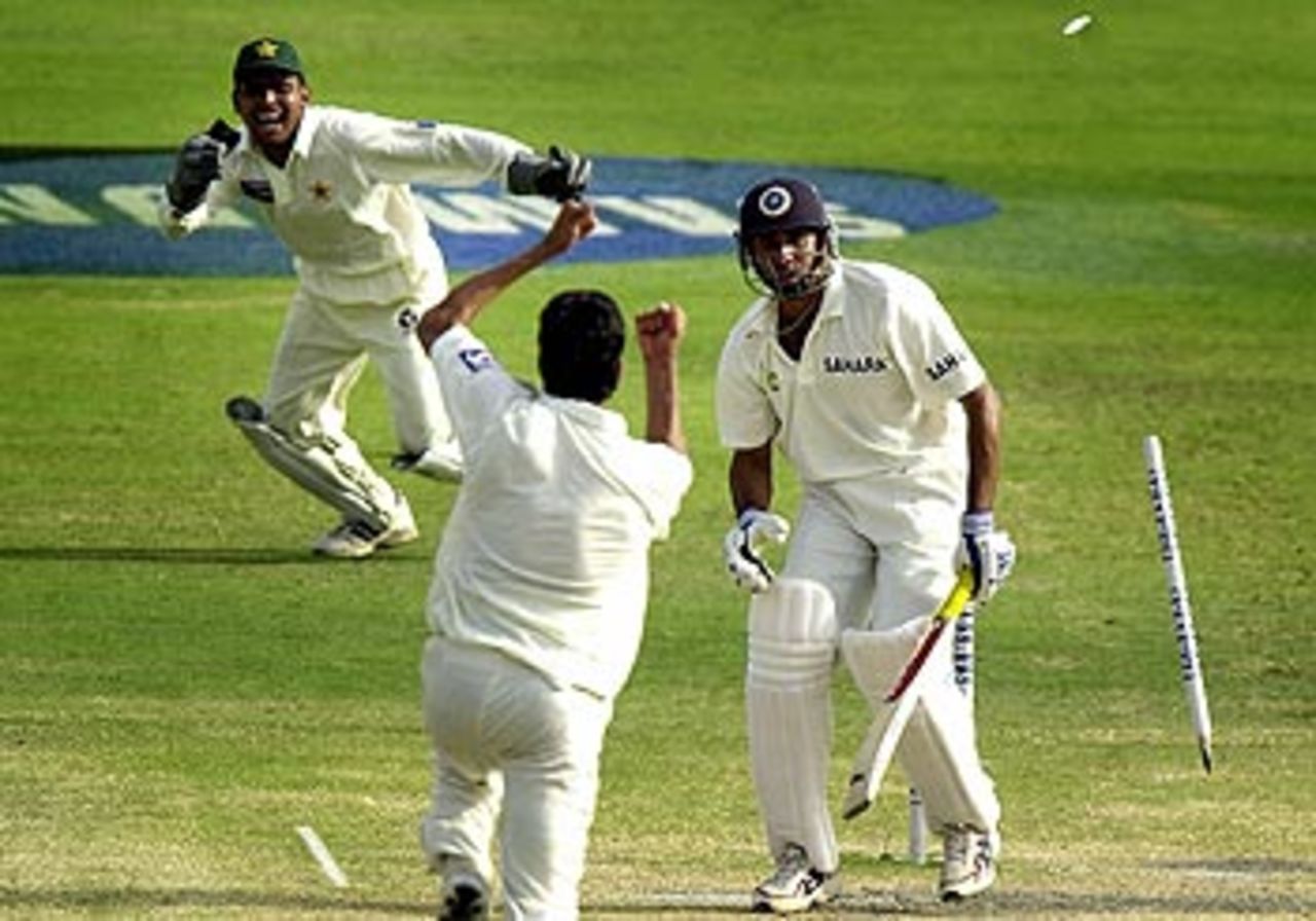 What the ... - Umar Gul dismisses VVS Laxman with the ball of the match, Pakistan v India, 2nd Test, Lahore, 3rd day, April 7, 2004