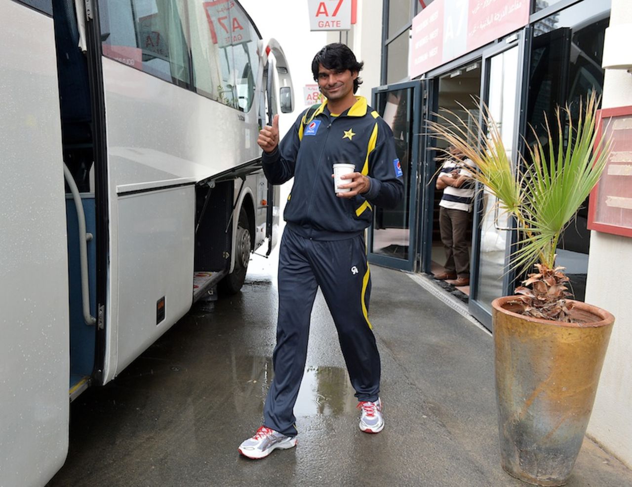 Mohammad Irfan is all smiles before boarding the bus, Dubai, January 7, 2014
