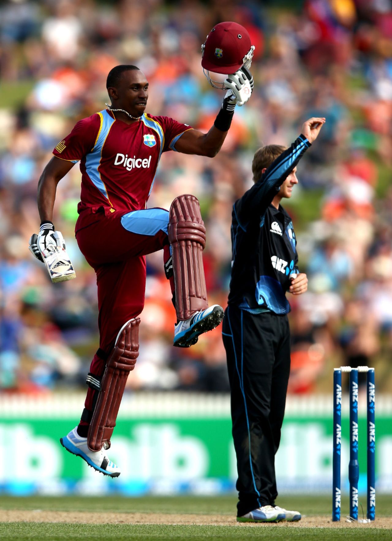 Dwayne Bravo leaps in celebration of his second ODI hundred, New Zealand v West Indies, 5th ODI, Hamilton, January 8, 2013
