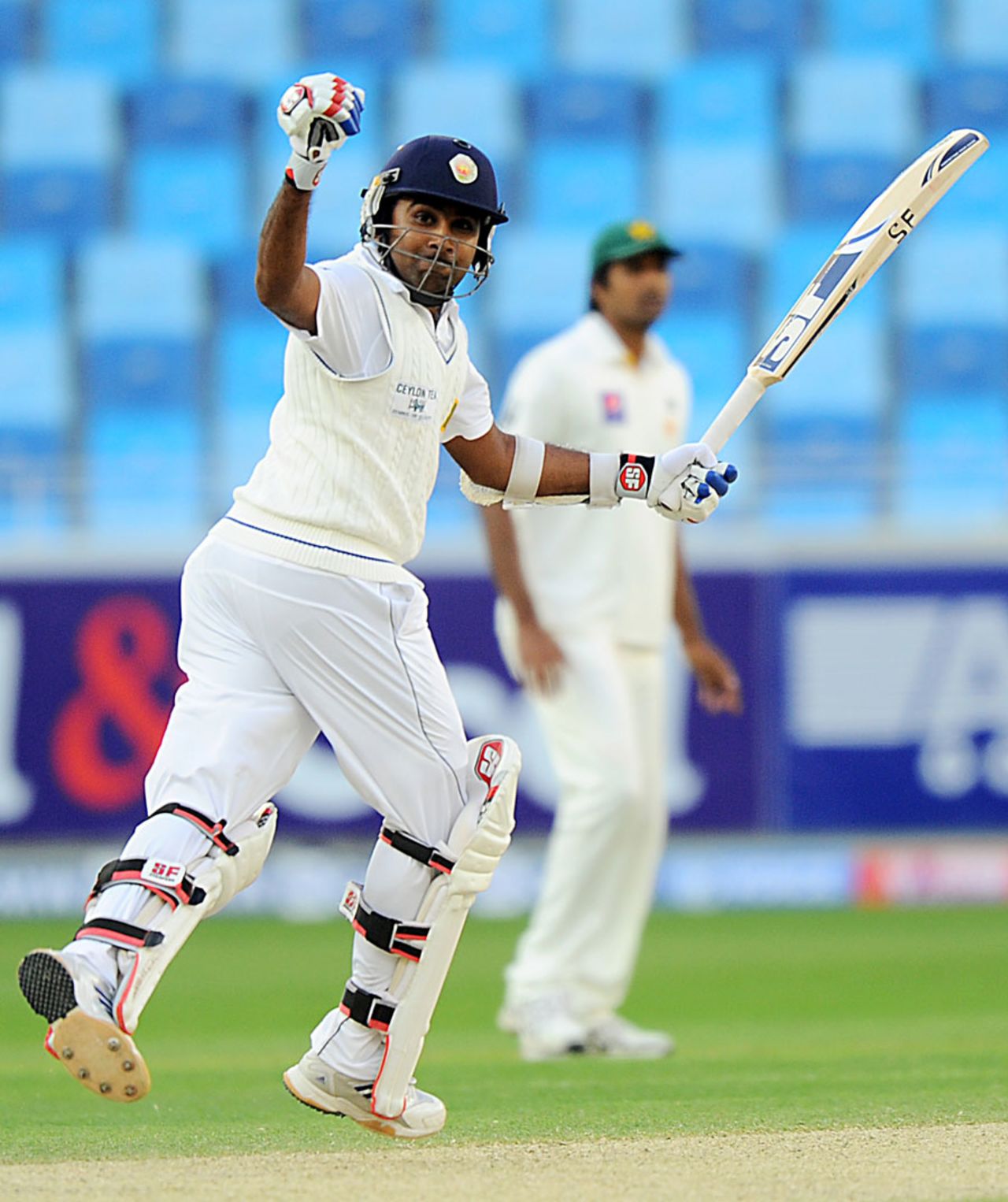 Mahela Jayawardene was quite pleased to reach his century, Pakistan v Sri Lanka, 2nd Test, Dubai, 2nd day, January 9, 2014